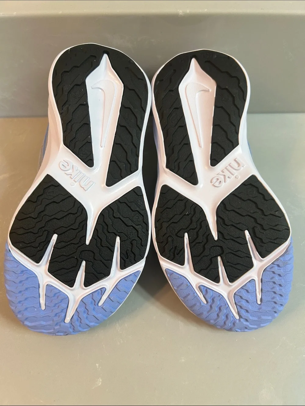 Nike Kids Grey Sneakers with Blue Swoosh